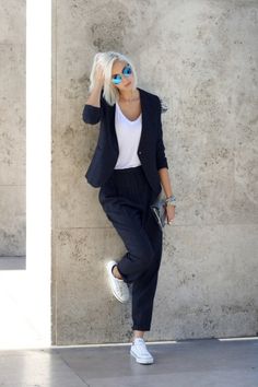 pinstripe suit and sneakers